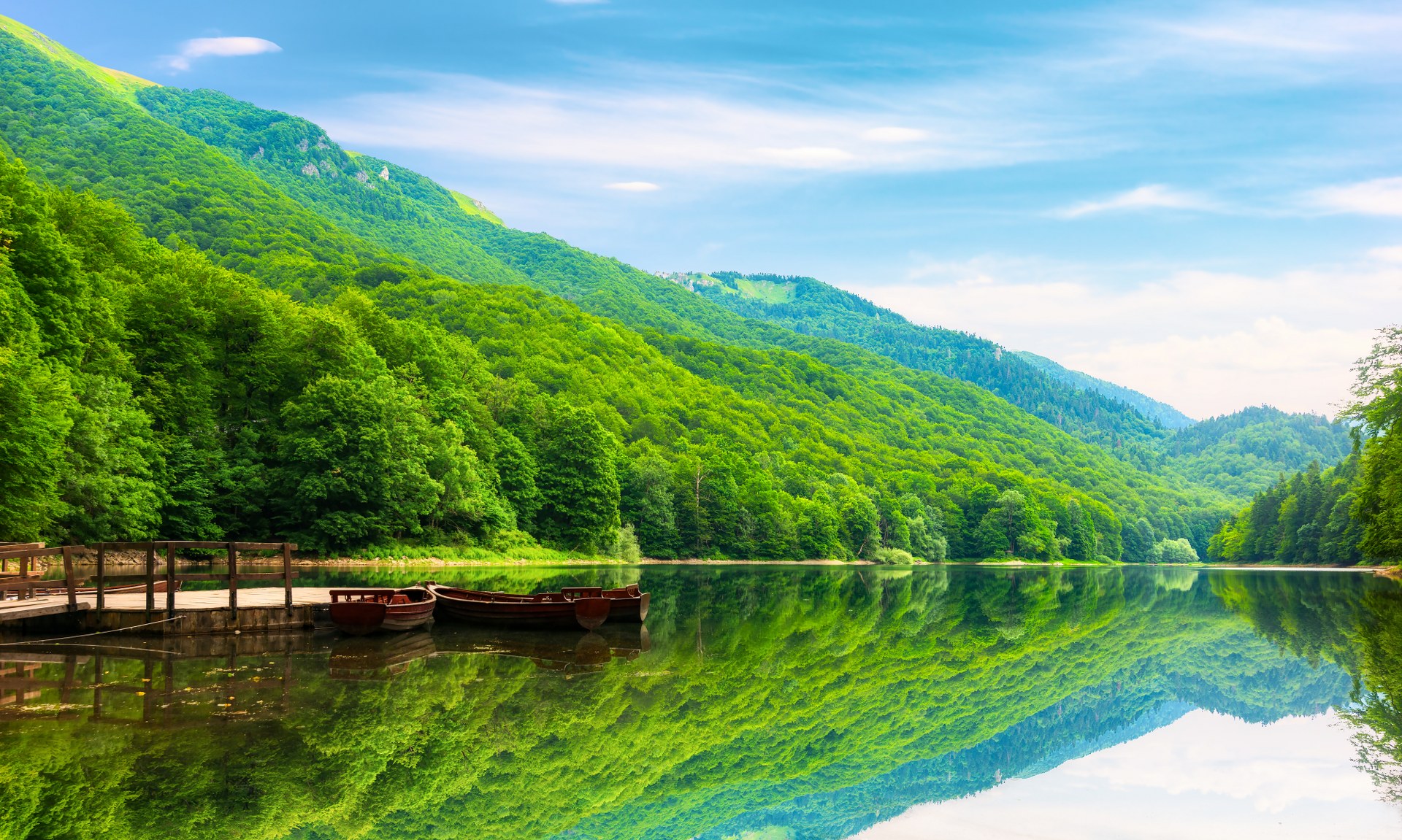 Wooden boats on Biogradskoe lake in mountains of Montenegro